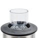 A stainless steel container for a Hamilton Beach food blender.