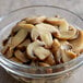 A bowl of Regal mushroom pieces and stems.