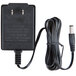 A white Taylor AC adapter with a black cord.
