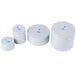 Three white plastic containers with blue writing on the front.