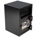 A black FireKing depository security safe with a key lock.