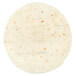 A white Mission flour tortilla with orange spots.