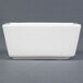 A close-up of a white rectangular CAC China bowl.