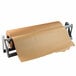 A Bulman paper cutter holding a roll of brown paper.