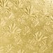 A gold round cake drum with a white surface and a gold leaf pattern.