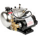 A McCann's Big Mac Fastflow carbonator with a hose attached to it.