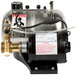 A McCann's Big Mac Fastflow Carbonator machine with a black and silver cylinder and hose attached.