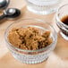 A bowl of Golden Barrel dark brown sugar with a spoon in it.