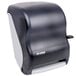 A black and grey San Jamar lever roll towel dispenser.