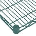 A close-up of a green Metro 2442NK3 Super Erecta Metroseal 3 wire shelf.