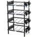 A black metal rack with several black cylinders.