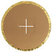 A white circular cardboard with a gold cross cut out of it.