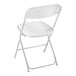 A white Lancaster Table & Seating folding chair with a backrest.
