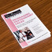 A book titled "Increasing Restaurant Sales" on a table in a professional kitchen.
