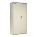 A white FireKing storage cabinet with silver handles on the doors.