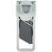 A grey and white Matfer Bourgeat mandoline with a grey plastic holder.