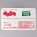 A white box of Fresh Gourmet Dried Cranberries with red and green labels.