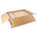 A white box with European Bakers white bread loaves inside.