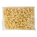 A bag of Ore-Ida Golden Tater Tots with cheese on a white background.