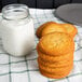 A stack of David's Cookies sugar cookies on a white table.