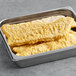 A metal tray of High Liner Foods Budweiser Battered Alaska Pollock Fillets.