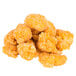 A pile of Brakebush popcorn chicken on a white background.