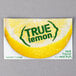 A close up of a True Citrus lemon packet.