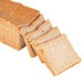 A loaf of European Bakers whole wheat bread with slices cut off.