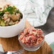 A bowl of brussels sprouts and bacon with Hatfield bacon topping.