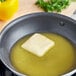 A pan with a piece of Alpine Valley 60/40 Buttery Blend in it on a counter in a home kitchen.