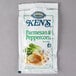 A Ken's Foods Select Parmesan and Peppercorn dressing packet.
