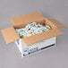 A box of Ken's Foods Parmesan and Peppercorn dressing packets.