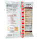 A white bag of Trio chicken gravy mix with red text on it.