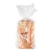 A loaf of sliced Italian panini bread in a clear plastic bag.