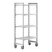 A white plastic Cambro Camshelving® Premium mobile shelving unit with four shelves and wheels.