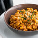 A bowl of pasta with Casa Di Lisio Sundried Tomato Pesto on top.