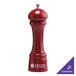 A Chef Specialties red pepper mill on a counter.