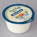 A container of Ken's Foods Bleu Cheese dressing with a label.