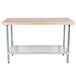 An Advance Tabco wood work table with a galvanized metal base and undershelf.