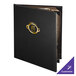 A black Menu Solutions Chadwick Collection menu cover with a gold logo on a table.