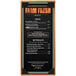 A black soft leather-like Menu Solutions Bella Collection menu cover with white text.