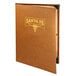 A brown leather Menu Solutions Bella Collection booklet menu cover on a table with a gold logo.