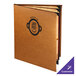 A brown leather Menu Solutions Bella Collection menu booklet with a black logo.