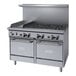 A stainless steel Garland commercial gas range with six burners, a griddle, and two ovens.