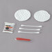 A Noble Eco Novo Terra hotel grooming kit with cotton swabs and sticks.