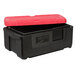 A black Metro Mightylite food pan carrier with a red lid.