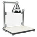 A Bon Chef carving station lamp with a chrome shade.