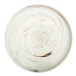 A white porcelain plate with brown swirly raised rim.