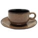 A brown and black Luzerne Rustic by Oneida coffee cup and saucer.