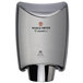 A close up of a silver World Dryer SMARTdri hand dryer.